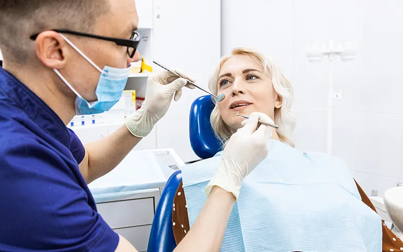 simply-teeth-dentist-with-female-patient-03 dentist with female patient