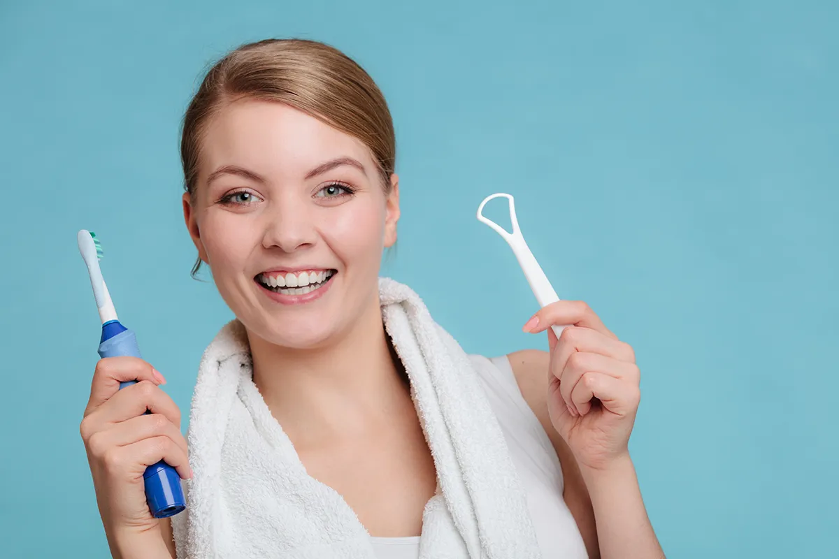 Scraping your tongue for better oral hygiene